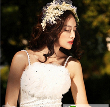 点击大图看下一张：最新新娘发型集锦 做男神中最美的女神