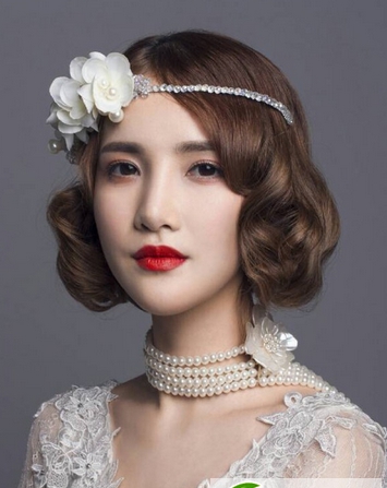 点击大图看下一张:新娘显瘦造型设计 最新时尚新娘发型设计图片