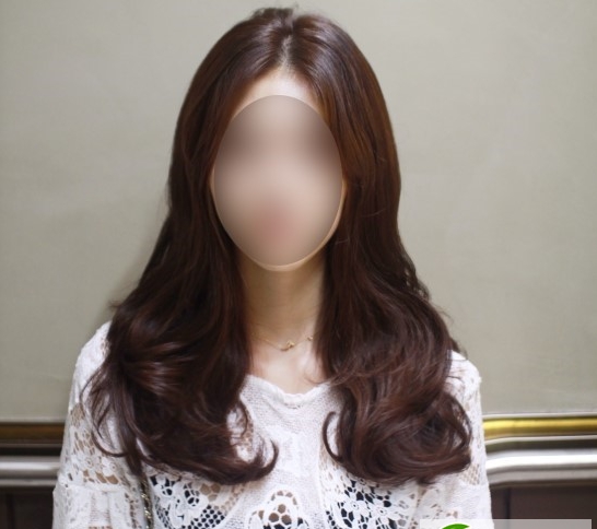 点击大图看下一张：韩式气质女生烫发发型 中长发时尚烫发发型
