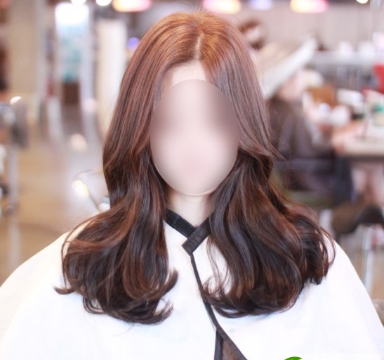 点击大图看下一张：韩式气质女生烫发发型 中长发时尚烫发发型