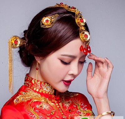 点击大图看下一张：唯美经典传统中式新娘发型