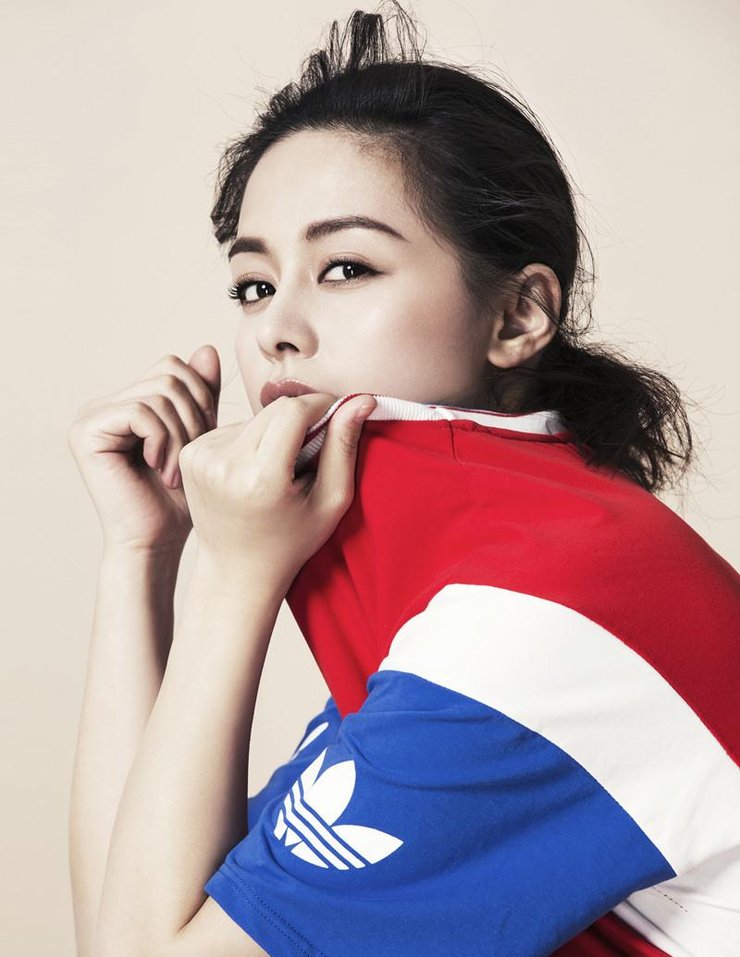 点击大图看下一张：王力可运动秀健美身材