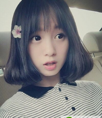 点击大图看下一张:黑色梨花头发型 纯净清新更显白皙肤色