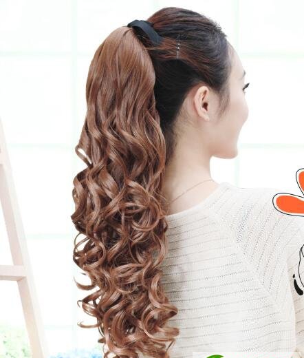点击大图看下一张：最美长梨花头卷发 最新流行发型设计