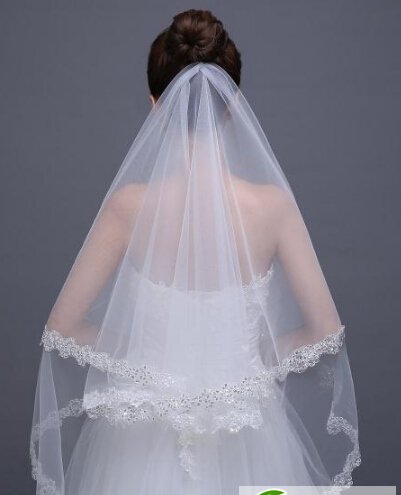 点击大图看下一张：最美头纱发型圣洁浪漫