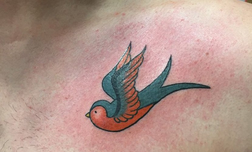 点击大图看下一张：多款漂亮的燕子纹身图案