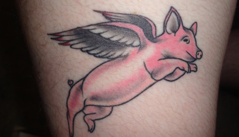 点击大图看下一张：可爱的猪纹身图案