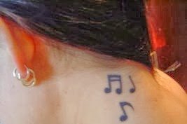 点击大图看下一张:各种个性的音符纹身图案