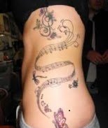 点击大图看下一张:各种个性的音符纹身图案