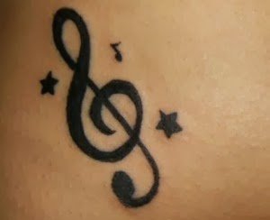 点击大图看下一张：各种个性的音符纹身图案