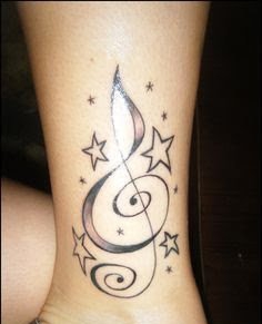 点击大图看下一张:各种个性的音符纹身图案