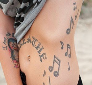 点击大图看下一张：各种个性的音符纹身图案