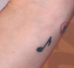 点击大图看下一张：各种个性的音符纹身图案