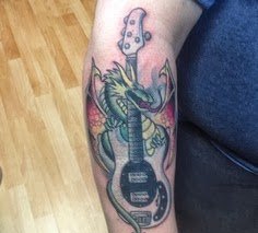 点击大图看下一张:各种个性的音符纹身图案