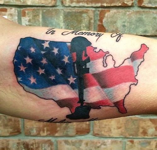点击大图看下一张：战争主题下的美国国旗纹身图案