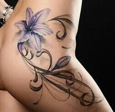 点击大图看下一张:女性大腿上各种样式漂亮的纹身图案