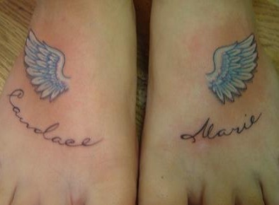 点击大图看下一张：女生脚上天使之翼纹身刺青图片