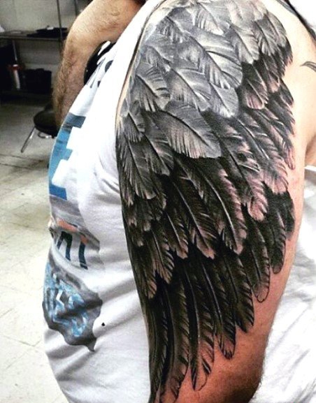 点击大图看下一张：多款男性帅气的手臂上的天使翅膀纹身图案