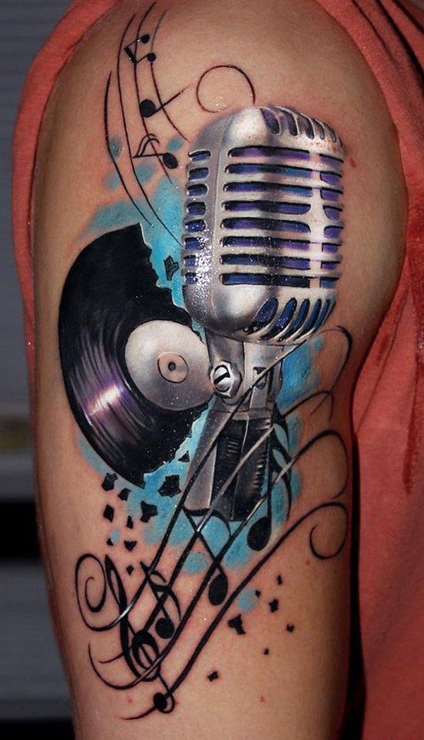 点击大图看下一张：多款帅气的音乐主题音符纹身图案