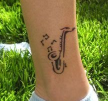 点击大图看下一张：多款帅气的乐器萨克斯纹身图案