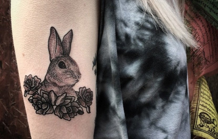 点击大图看下一张：多种风格可爱的兔子纹身图案