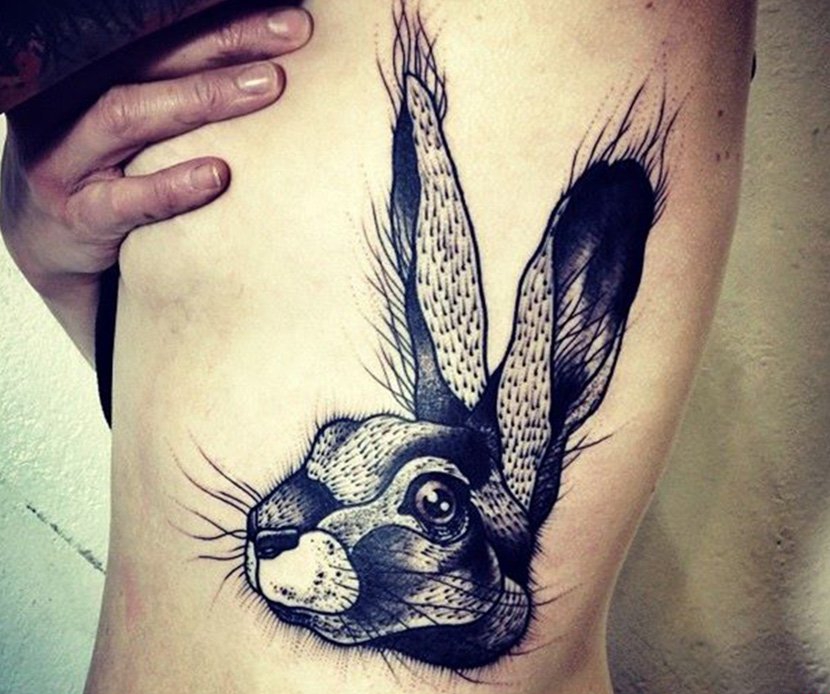 点击大图看下一张:多种风格可爱的兔子纹身图案