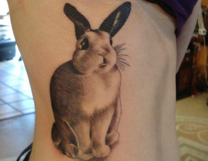 点击大图看下一张:多种风格可爱的兔子纹身图案