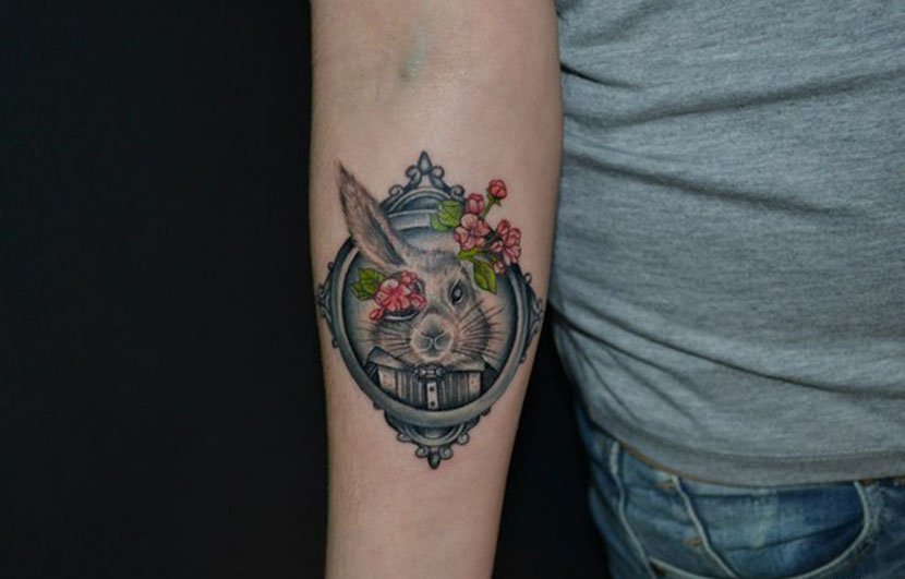 点击大图看下一张：多种风格可爱的兔子纹身图案