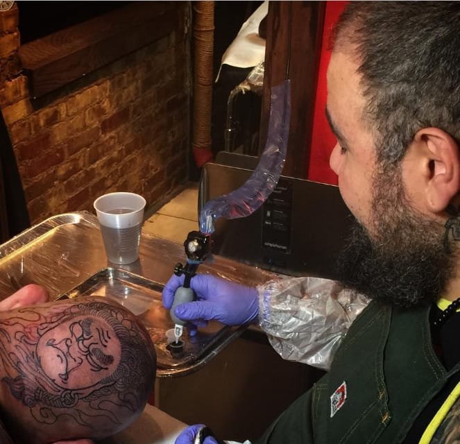 点击大图看下一张：日本风格大面积满背紧身纹身图案来自罗德里戈