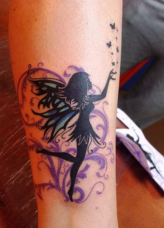 点击大图看下一张：美女身上多款漂亮可爱的精灵纹身图案