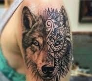点击大图看下一张：18款霸气的几何纹身狼纹身图案