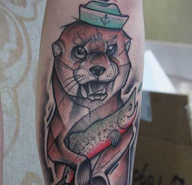 点击大图看下一张:20款可爱的生物水獭纹身图案