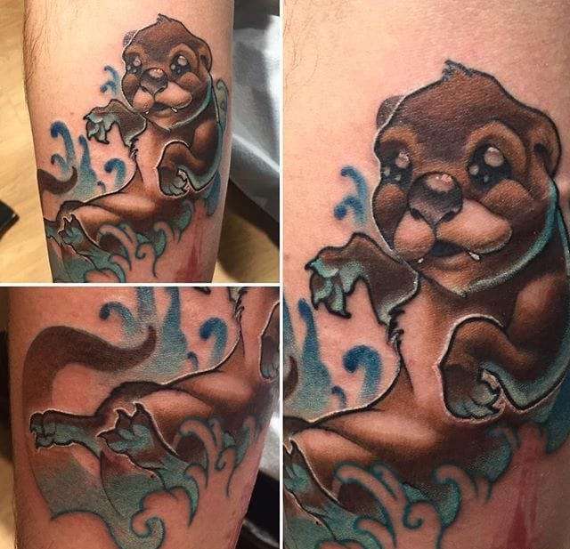 点击大图看下一张:20款可爱的生物水獭纹身图案