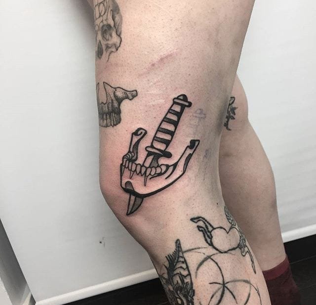 点击大图看下一张:简单有个性的黑白纹身图案来自于汤米