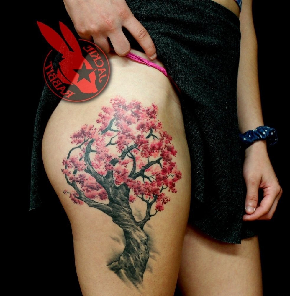 点击大图看下一张：女性喜爱的美丽的樱花纹身图案