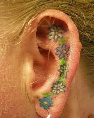 点击大图看下一张:20款女孩耳朵上的小清新纹身图案