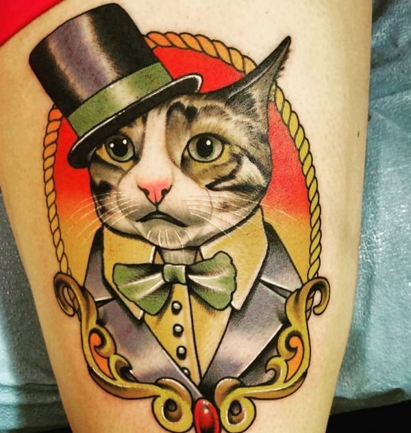点击大图看下一张：30款多种风格可爱的宠物猫纹身图案