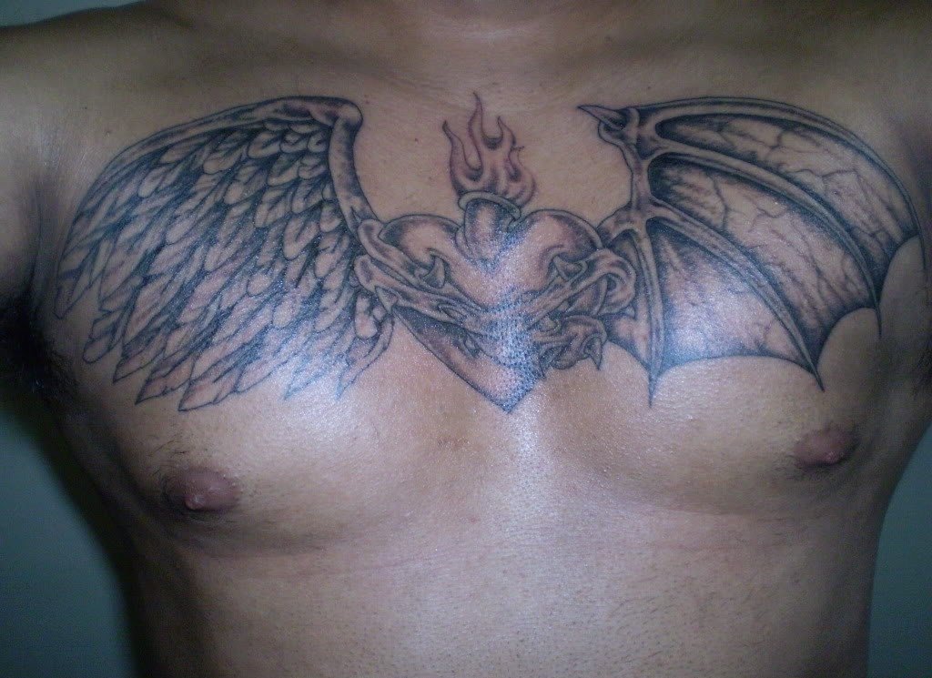点击大图看下一张：满胸漂亮的天使翅膀纹身图案