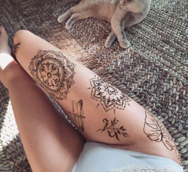 点击大图看下一张：女孩性感大腿上漂亮的装饰风格曼陀罗花纹身图案