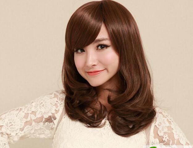 点击大图看下一张：显瘦中长梨花头 经典气质中长发