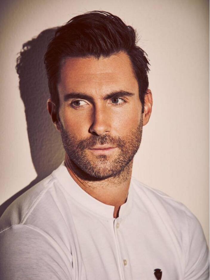 点击大图看下一张：亚当莱文的纹身