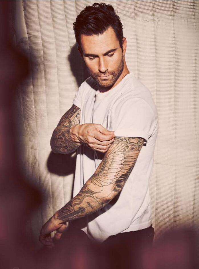 点击大图看下一张：亚当莱文的纹身