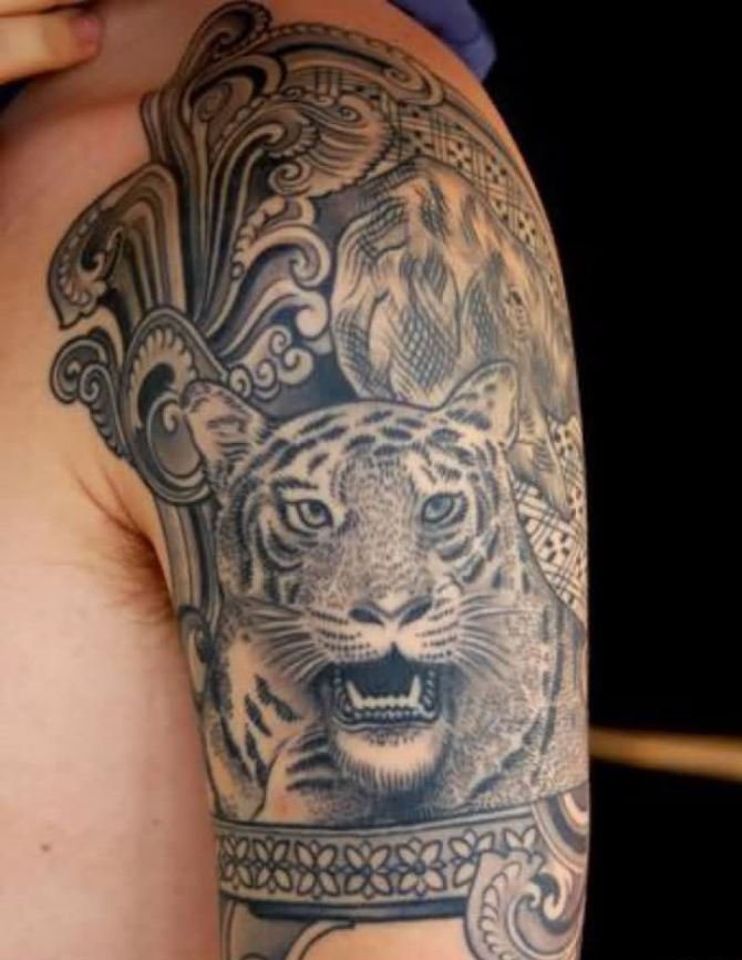 点击大图看下一张：手大臂膀上帅气的现实风格老虎纹身图案