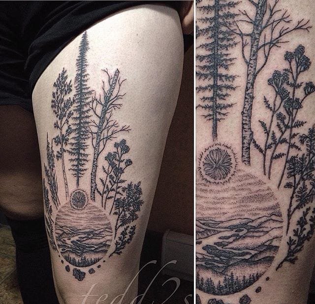 点击大图看下一张：黑色的植物树叶和花纹身图案来自于纹身师泰德