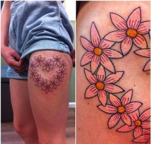 点击大图看下一张:30多款女性身上漂亮的雏菊花纹身图案