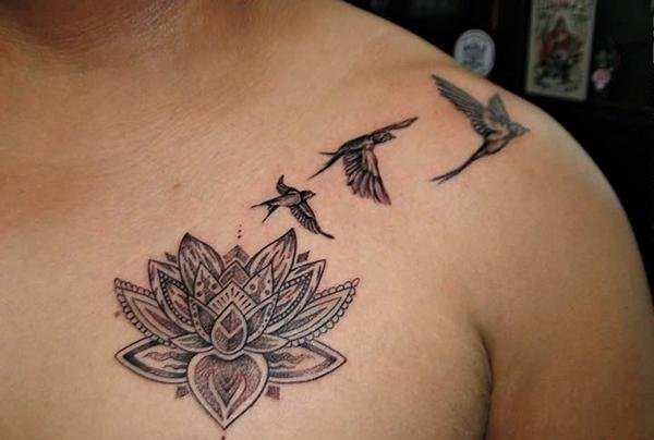 点击大图看下一张:多款精致漂亮的莲花纹身图案