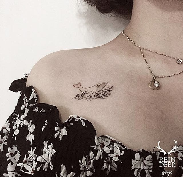 点击大图看下一张:海洋里可爱的小动物纹身黑灰色鲸鱼纹身图案