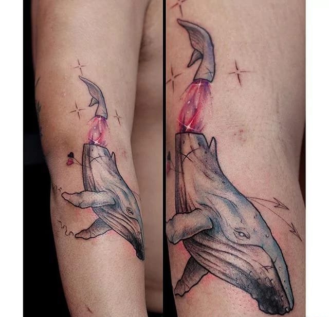 点击大图看下一张：海洋里可爱的小动物纹身黑灰色鲸鱼纹身图案