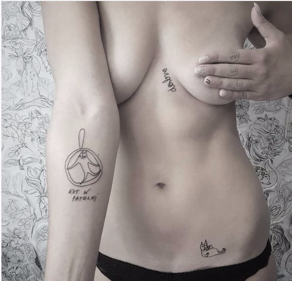 点击大图看下一张：黑色的卡通动物和人物简易画纹身图案来自于纹身师比昂卡