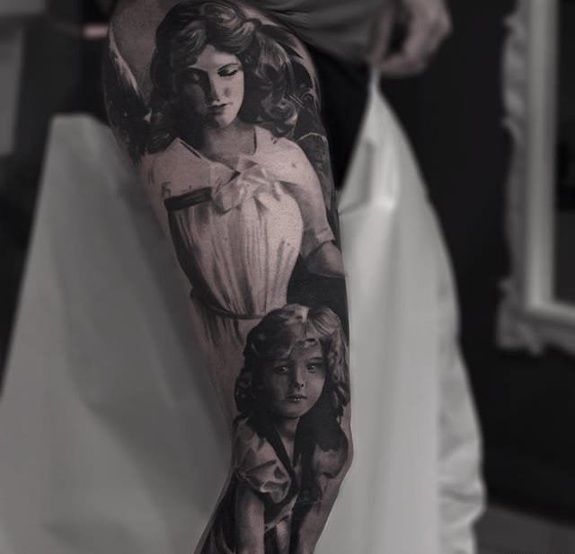 点击大图看下一张：经典的黑灰色花臂纹身图案来自于男纹身师西尔瓦诺